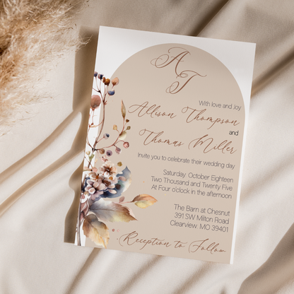 The invitation is 5x7 inches.  It has your initials up top, a beige arch with foliage as the background, cursive lettering for the names and reception to follow.  Easy to customize. 